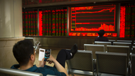 Global stocks modestly higher in quiet holiday trading