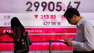 Asian shares fall as Fed minutes show data may tweak stance