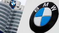 BMW profit hit by anti-trust case, spending on  technology