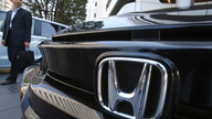 Honda reports fiscal quarterly loss, to streamline models