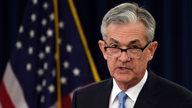 The Latest: Powell says politics not part of policy decision