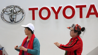 Toyota reports dip in quarterly profit, projects recovery