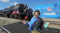 Descendants honor Chinese workers on railroad's 150th year