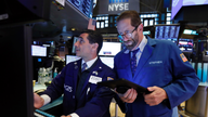 Stocks end rocky month lower as Trump widens trade war