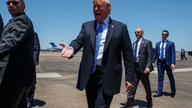 The Latest: Trump handicaps 2020 rivals at government event