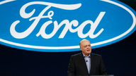 Seeing a twisting road ahead, Ford cuts 7K white-collar jobs