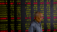 Asian shares slip as US-China spat takes center stage