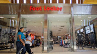 Foot Locker 1Q results miss Street, cuts earnings outlook