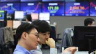 Asian shares mixed as markets await news on China-US trade