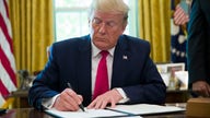 Trump signs executive order to impose ‘hard-hitting’ sanctions on Iran