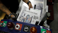 A newspaper bucks layoff trend, and hopes readers respond