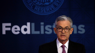 Powell hints Fed will cut rates if needed over trade wars