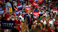 AP FACT CHECK: Trump's boasts, blasts and promises at rally