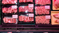 China suspends imports from Canadian pork company