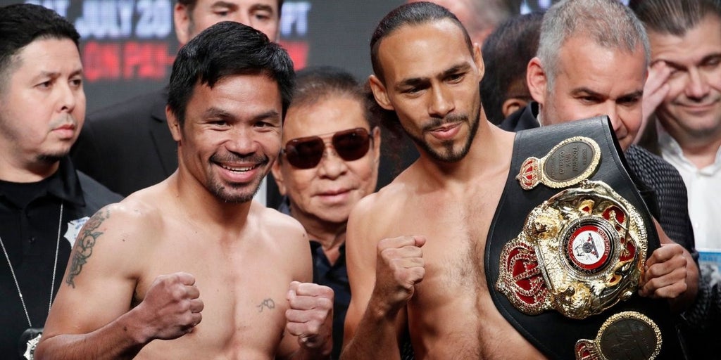 Manny Pacquiao defeats Chris Algieri by unanimous decision to retain  welterweight title - ESPN