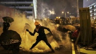 Protesters clash in Hong Kong as cycle of violence intensifies