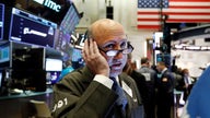 Stocks end mixed with trade deals in focus