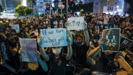 Hong Kong protest organizer challenges Trump to help ‘contain China’