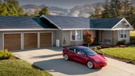 Tesla testing solar roof as Musk promises production ramp