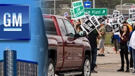 GM gets jab from UAW, members want cars built in USA as strike drags on