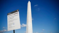 What did it cost to restore the Washington Monument?