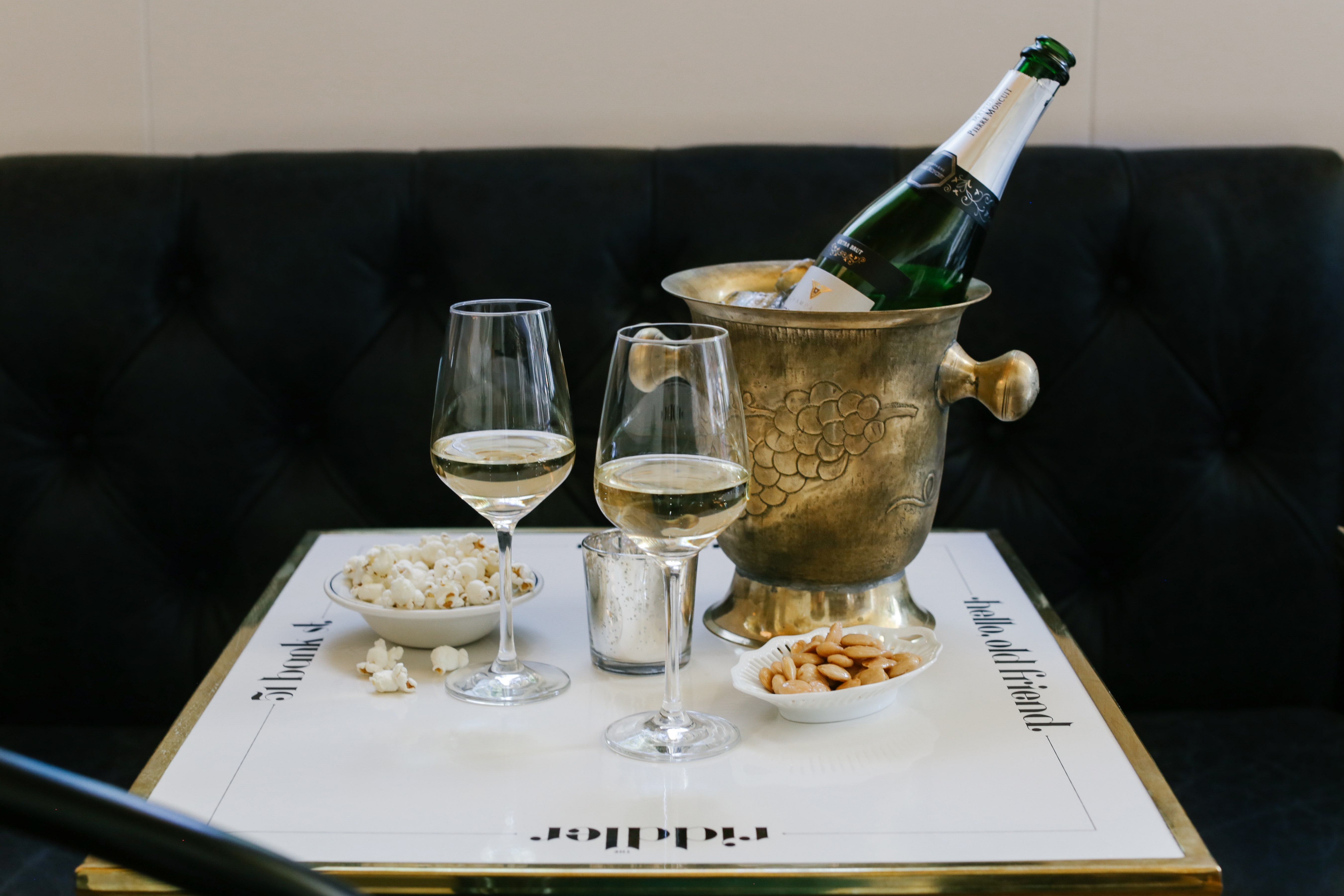 Champagne with that cheeseburger? Sparkling wine bars mix the exotic