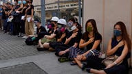 Hong Kong protesters rally, slamming police for shooting teen