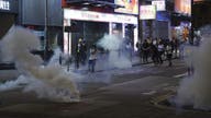 Hong Kong enters recession as street protests erupt in flames