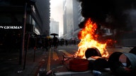 Hong Kong protester shot by police during mass China National Day demonstration