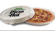 Pizza Hut to test plant-based 'meat' topping, compostable round box