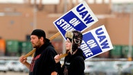 UAW strikes deal with Mack Trucks and continues voting for GM walkout to end