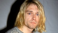 Kurt Cobain’s sweater and Fender guitar to hit auction block