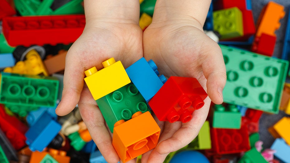 Lego bricks in child's hand
