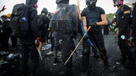 Photos show Hong Kong college campus erupting in epic battle