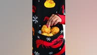Red Lobster’s new ugly sweater has a pocket for what?