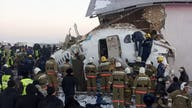 12 killed, dozens hurt after plane crashes in Kazakhstan