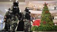 Hong Kong marchers target malls in third day of Christmas protests