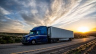 Trucking giant slashes outlook due to oversupply