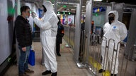 Virus death toll in China rises to 56 as US prepares evacuation