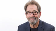 Huey Lewis pushes past hearing pain to keep making music