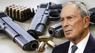 Democrat contender Bloomberg's gun control group helps city sue firearms-maker