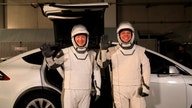 SpaceX astronauts ride in Tesla cars to space station launchpad