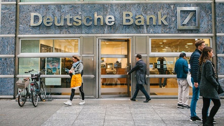 Deutsche Bank hints at loan defaults among customers as profit falls from last year