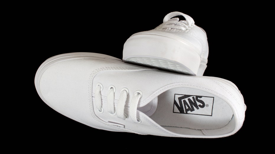 Vans' white slip-on shoes 