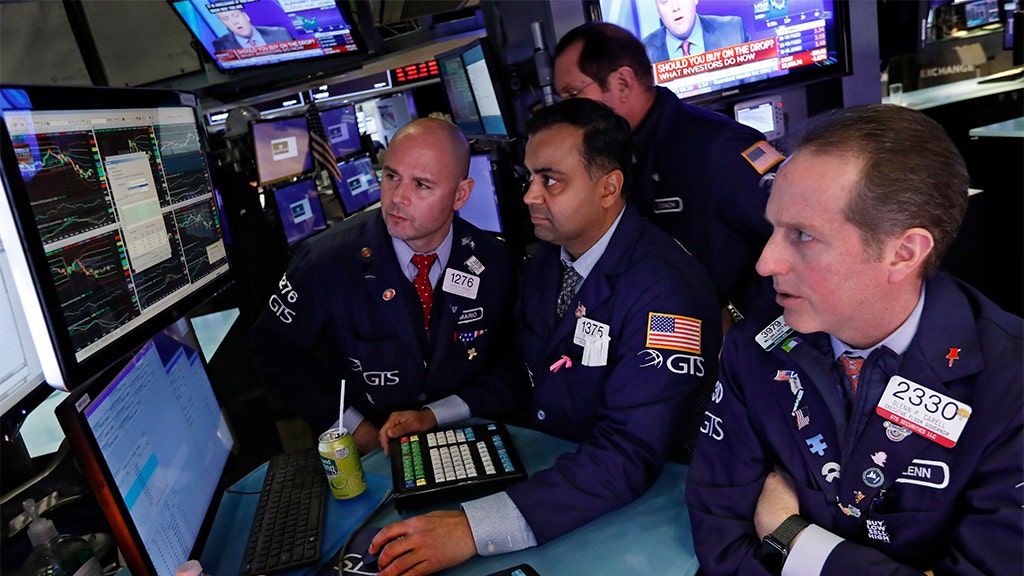 Dow closes in bear market amid volatile session