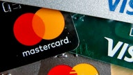 Visa, Mastercard could raise swipe fees on many merchants: sources