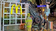 Man's car slams into McDonald's after he drove off parking garage, authorities say