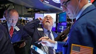 Dow, S&P surrender gains amid coronavirus frenzy as Nasdaq hangs on