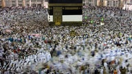 Saudi Arabia halts pilgrimages over virus; Iran cases spike