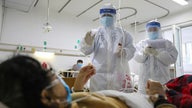 Coronavirus death toll nears 1,400 in China, with 5,090 new cases